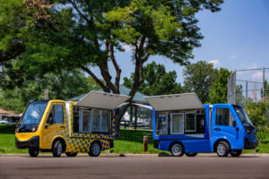image of two food service electric vehicles | mobile carts kiosks food beverage retail sports entertainment venues travel centers hospitals 
